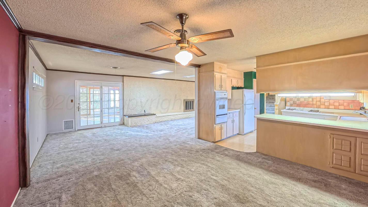 5015 Southwest 53rd Avenue Amarillo, TX 79109 - Photo 9 of 26 a view of a kitchen with a sink and a window