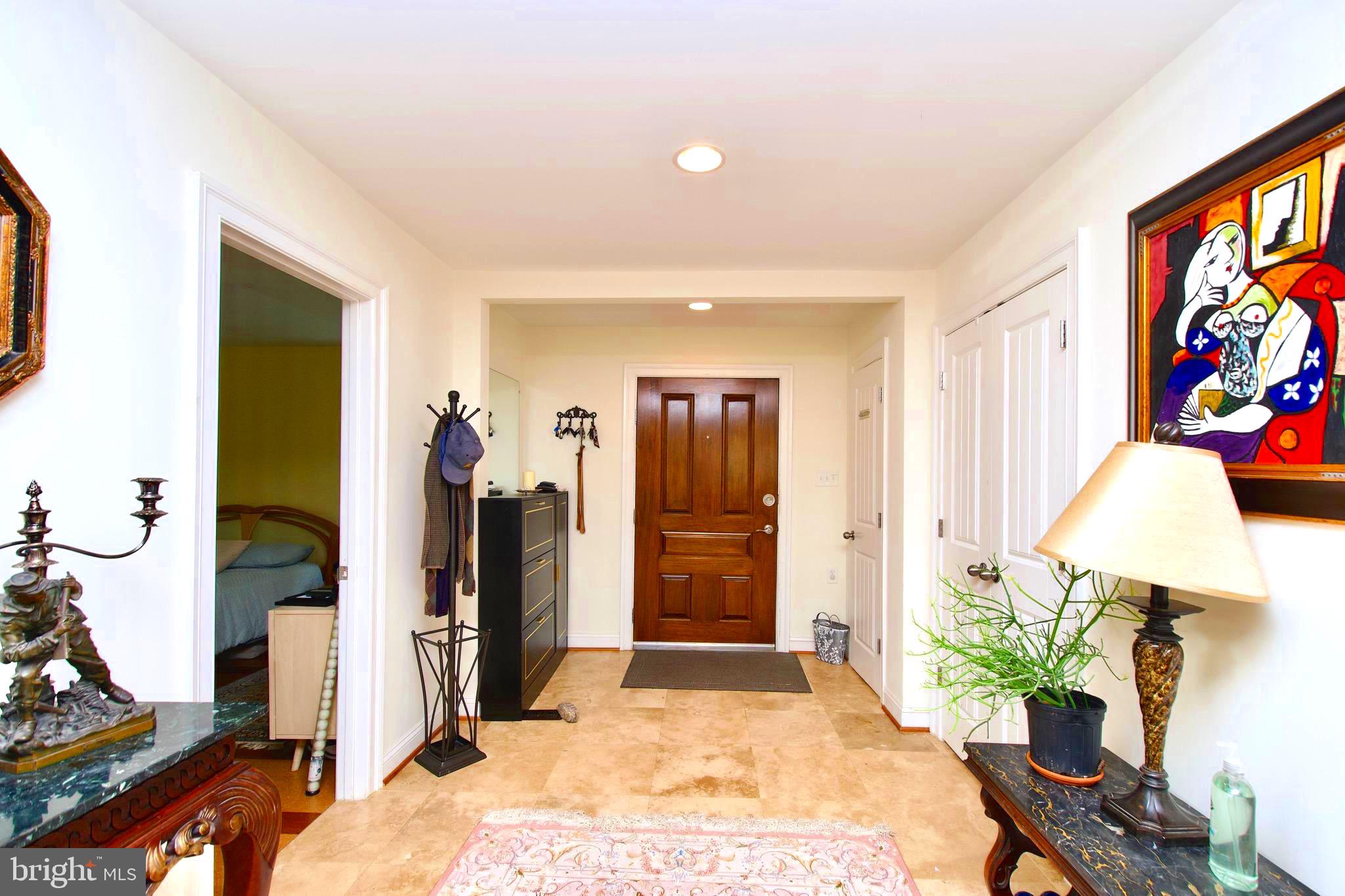 8312 Upper Spring Lane Annandale, VA 22003 - Photo 3 of 56 a living room with furniture and a flat screen tv