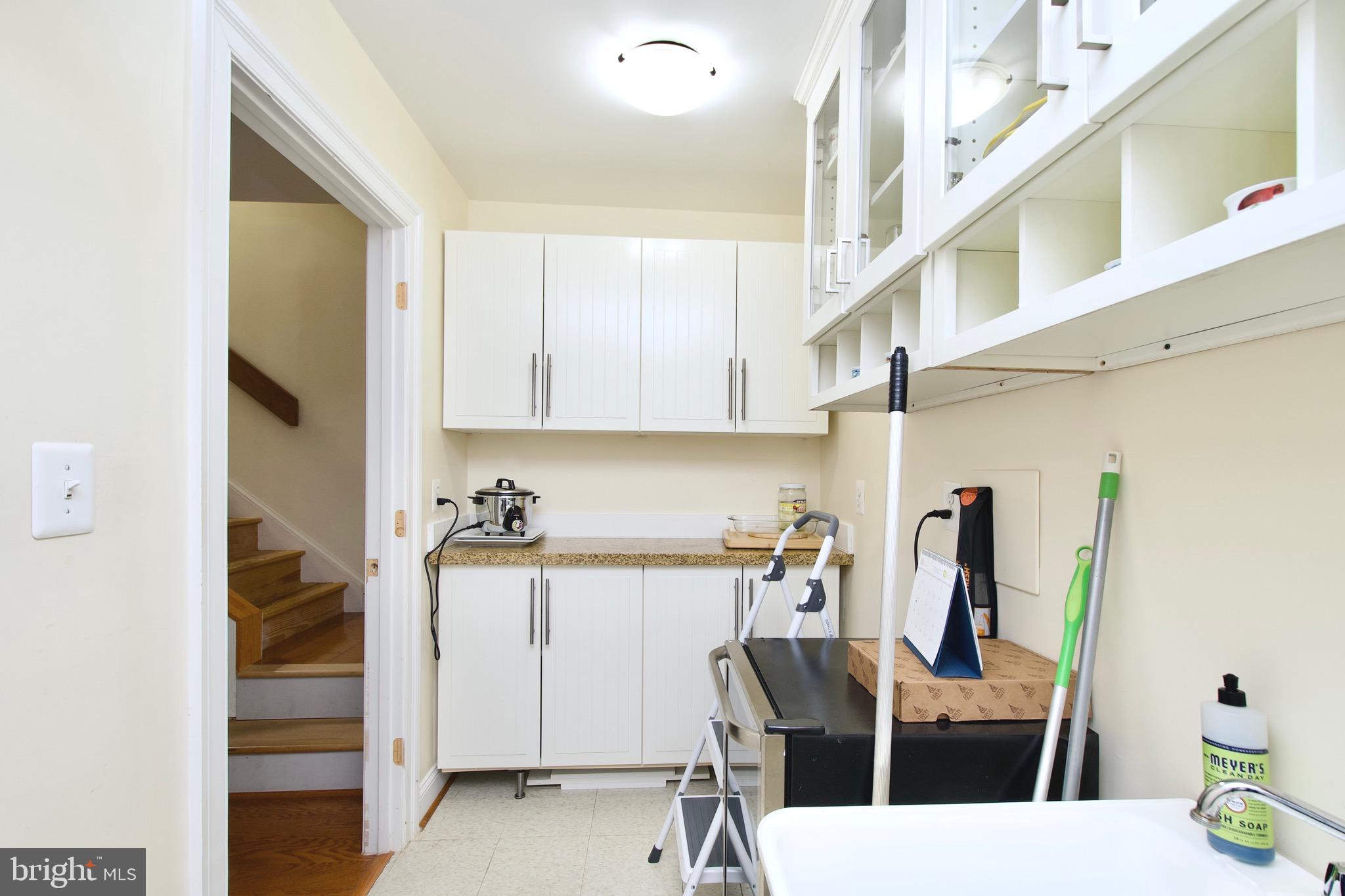 8312 Upper Spring Lane Annandale, VA 22003 - Photo 33 of 56 a view of a kitchen with appliances and cabinets