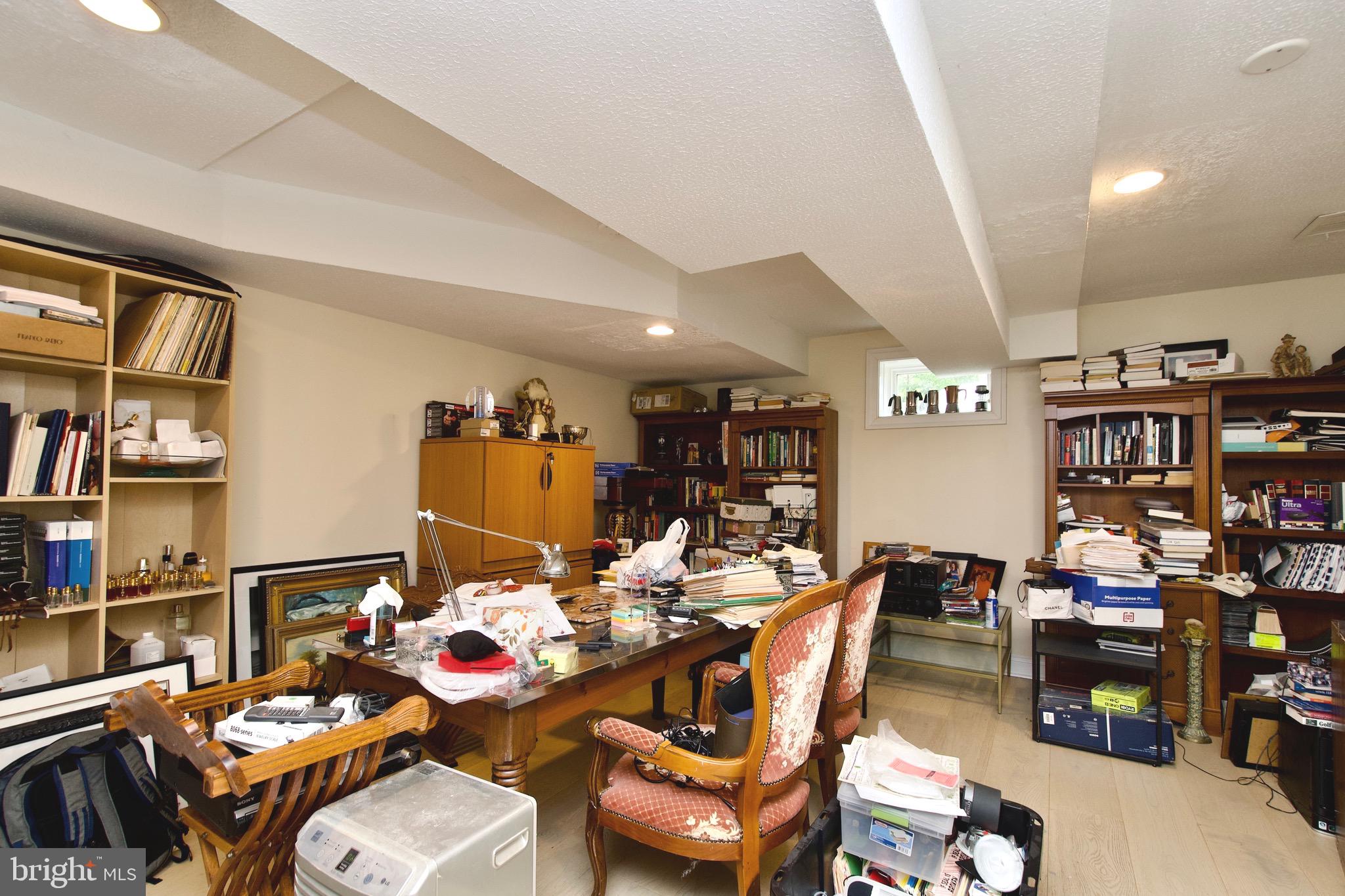 8312 Upper Spring Lane Annandale, VA 22003 - Photo 35 of 56 a living room with lots of furniture and baby kitchen view