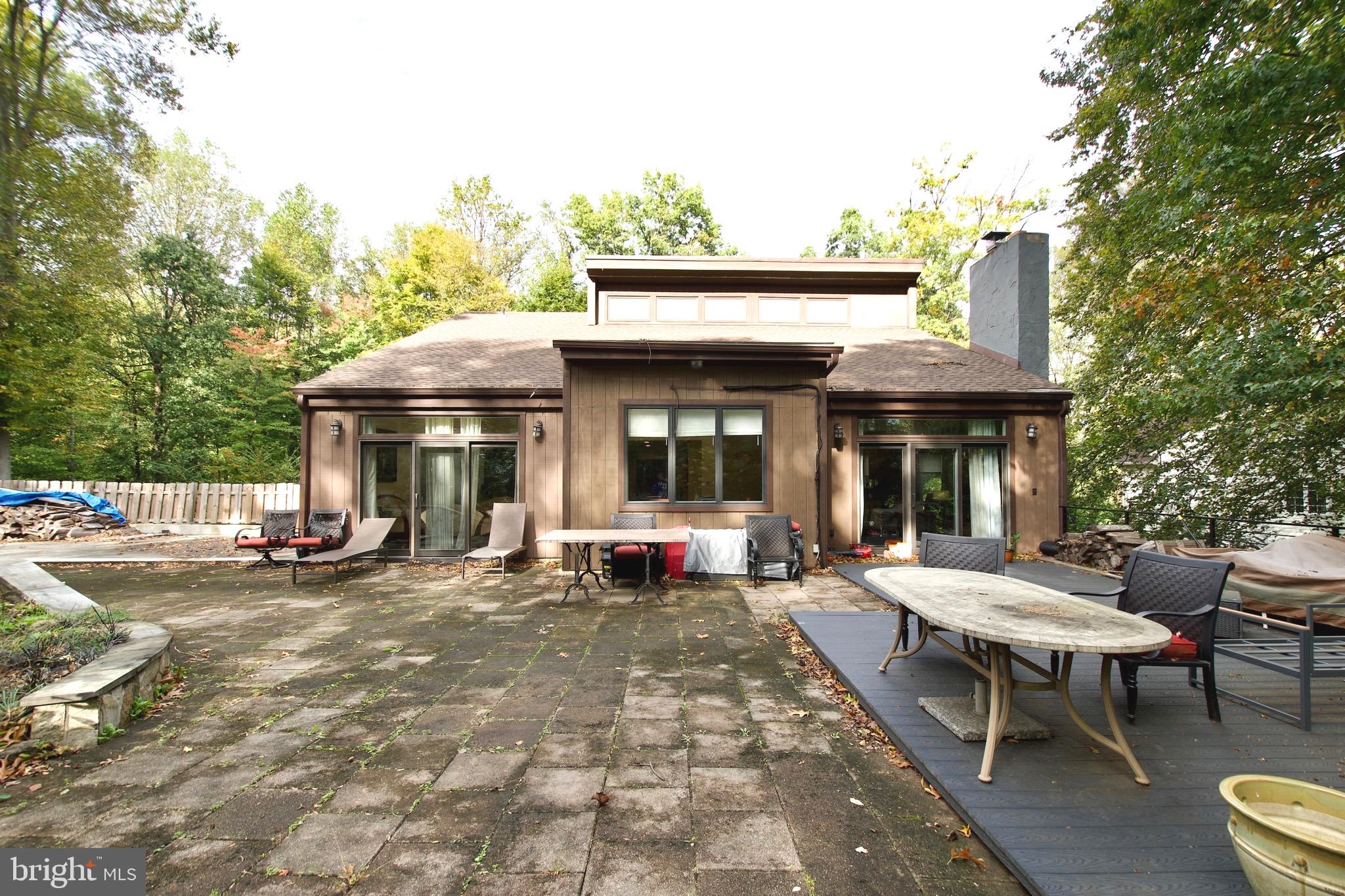 8312 Upper Spring Lane Annandale, VA 22003 - Photo 47 of 56 a view of a dinning table and chairs in the patio
