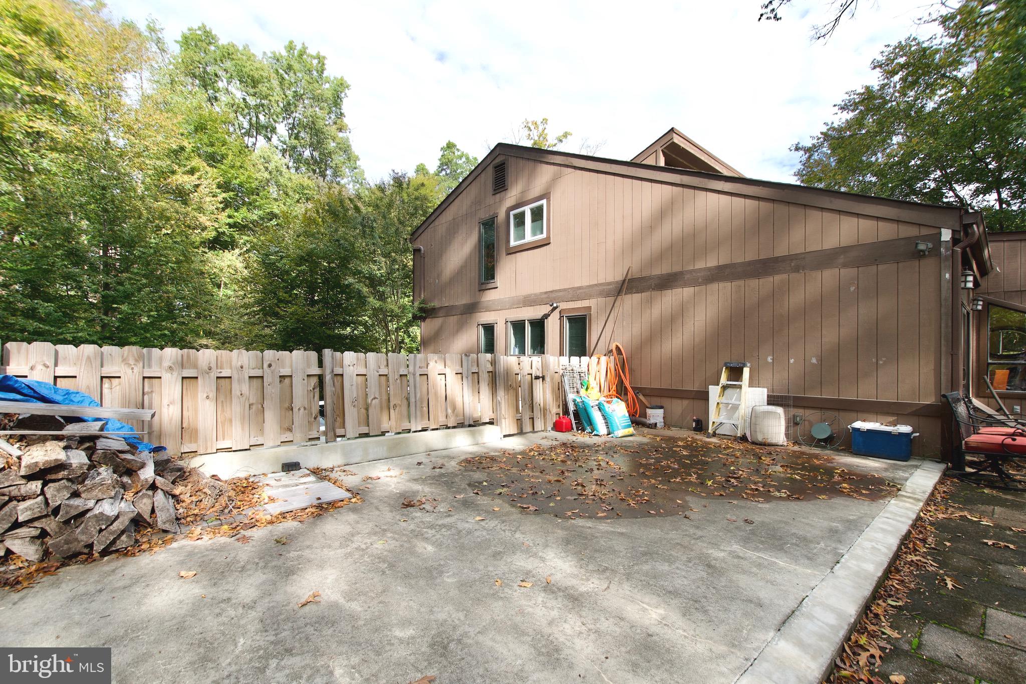 8312 Upper Spring Lane Annandale, VA 22003 - Photo 48 of 56 a view of a house with a patio