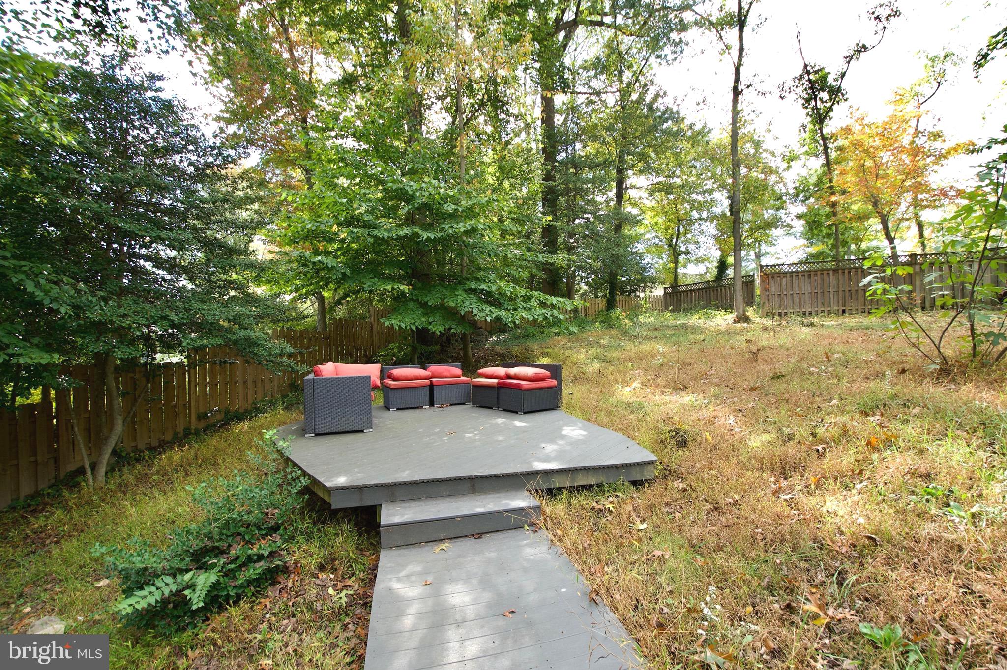8312 Upper Spring Lane Annandale, VA 22003 - Photo 55 of 56 a view of a backyard with table and chairs