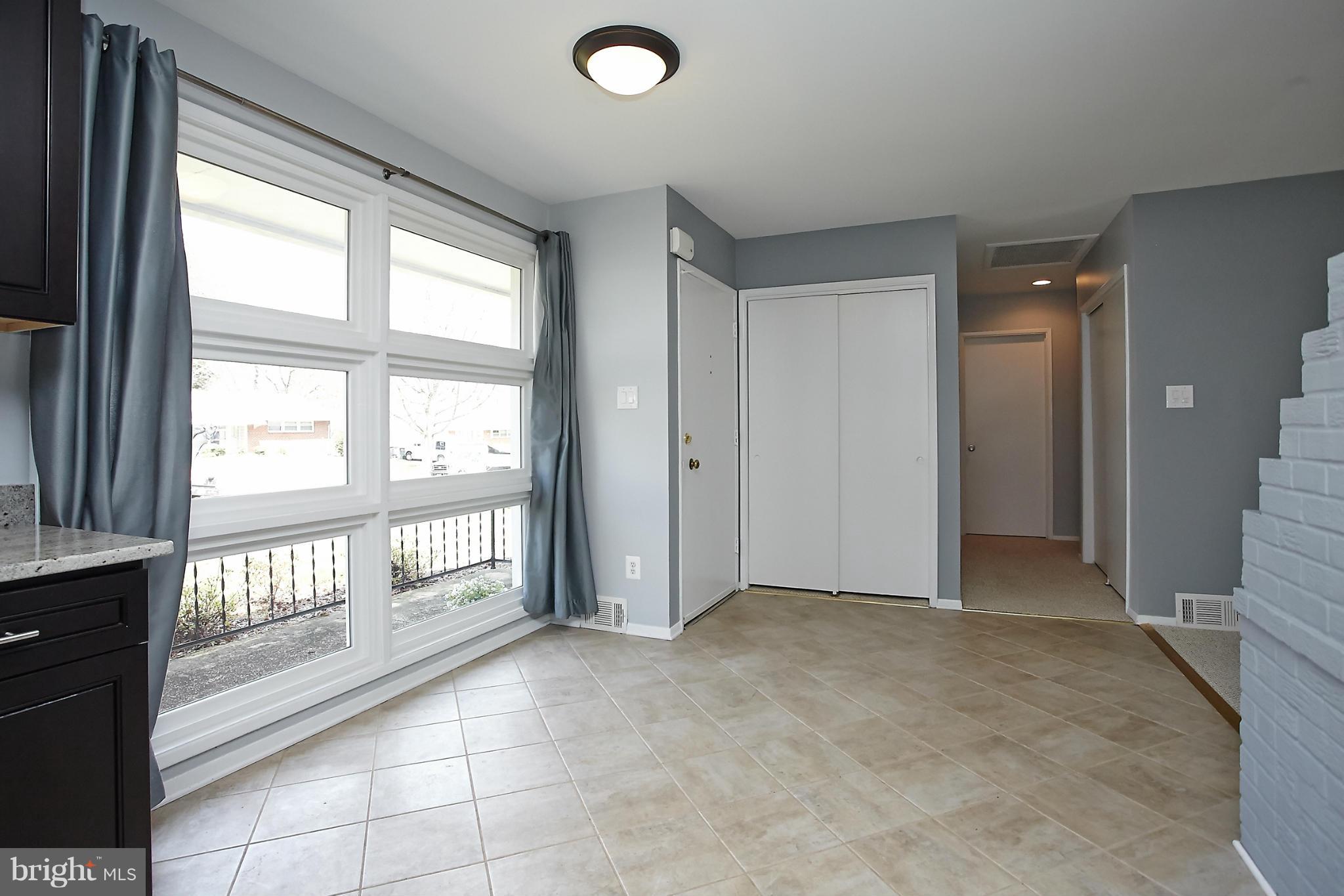 6717 Bostwick Drive Springfield, VA 22151 - Photo 7 of 12 an empty room with windows