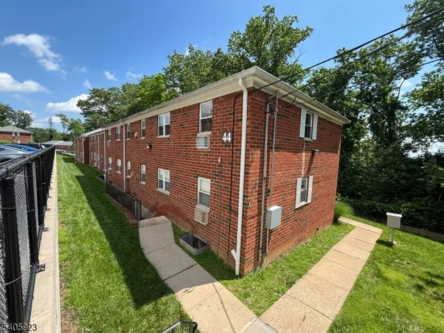 a front view of a house with yard