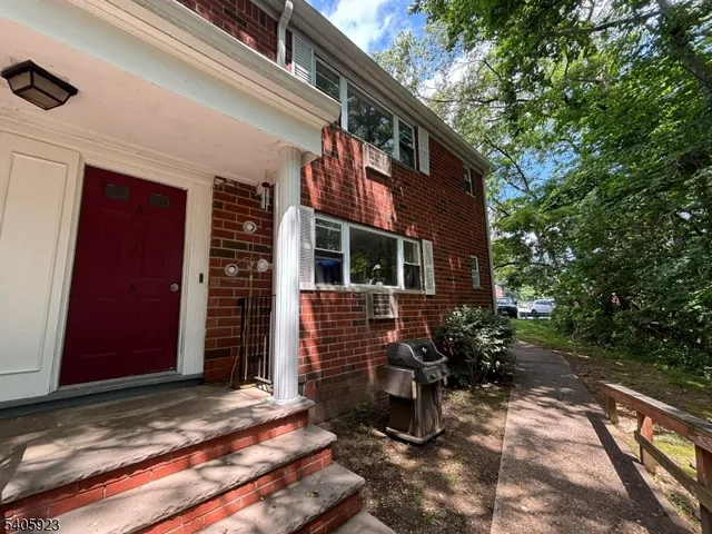 a view of house with outdoor seating space