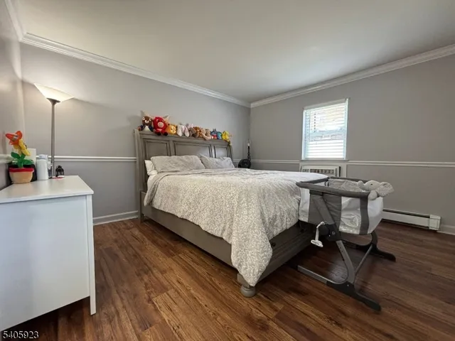 a bedroom with a bed and a table in it