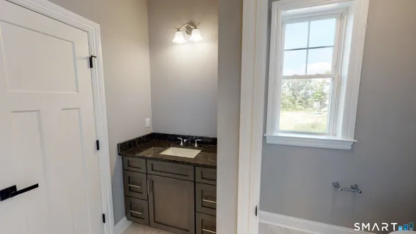 a utility room with window washer and dryer