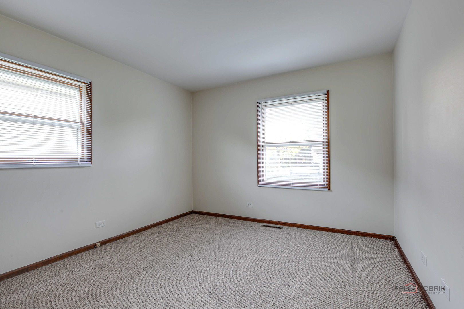 103 Quail Run Lake In The Hills, IL 60156 - Photo 11 of 25 an empty room with a window