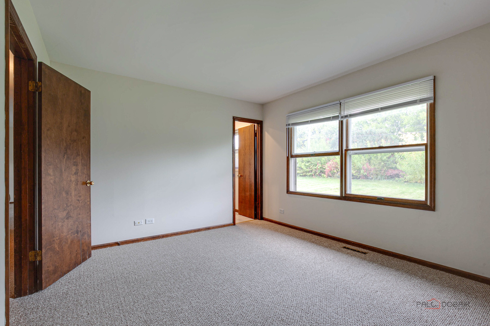103 Quail Run Lake In The Hills, IL 60156 - Photo 12 of 25 an empty room with a window