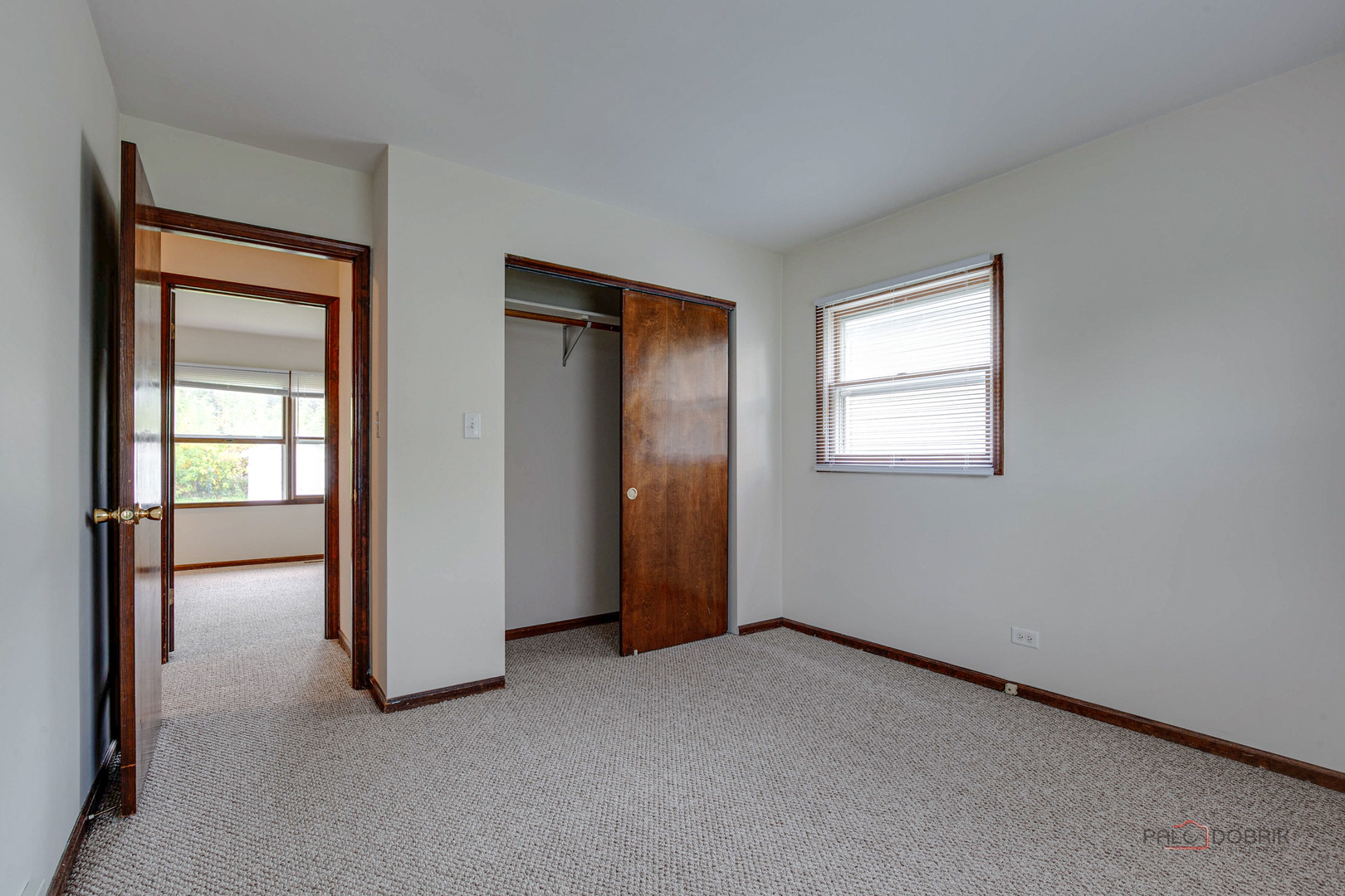 103 Quail Run Lake In The Hills, IL 60156 - Photo 6 of 25 an empty room with windows and closet