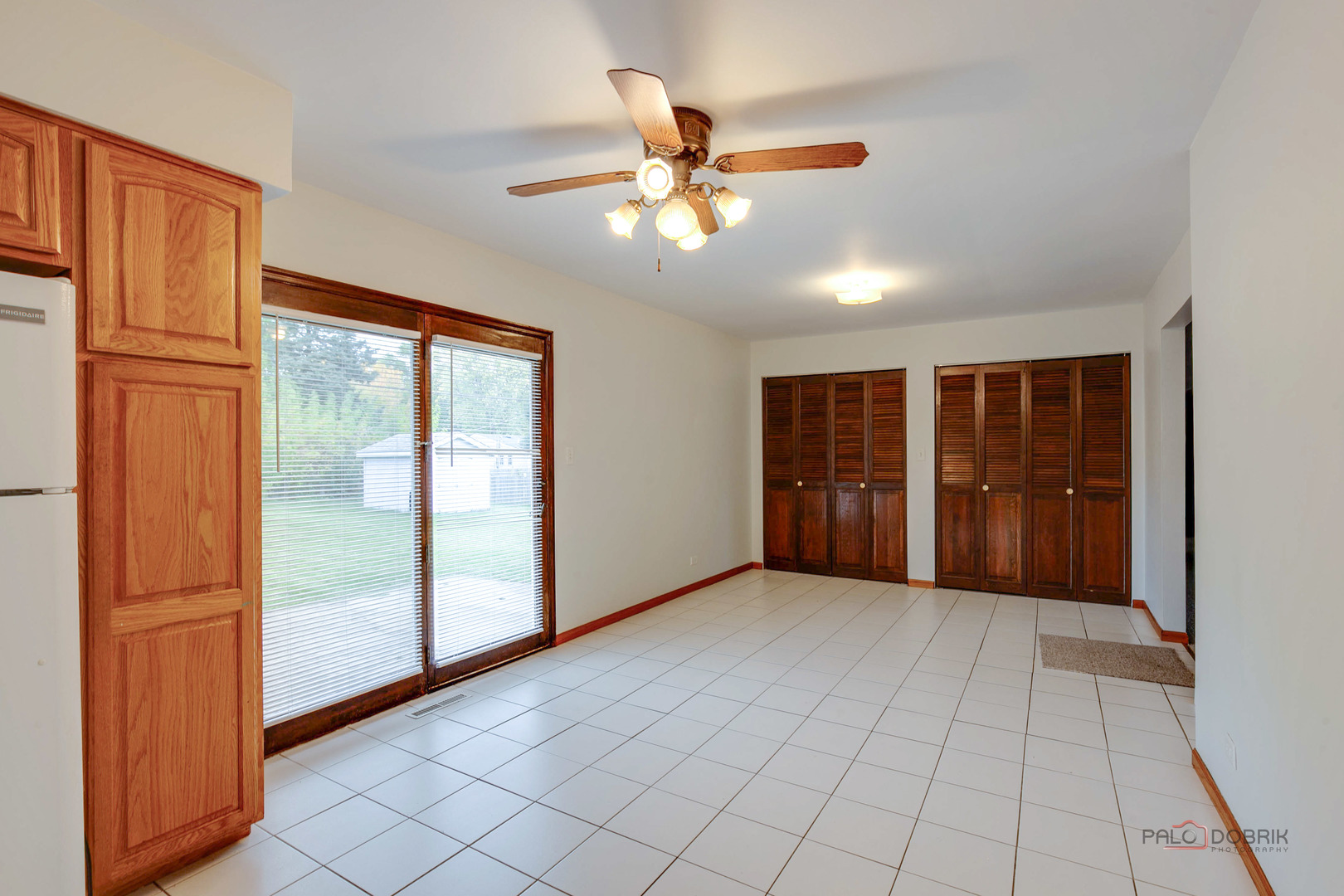 103 Quail Run Lake In The Hills, IL 60156 - Photo 7 of 25 a view of an empty room with closet and a window