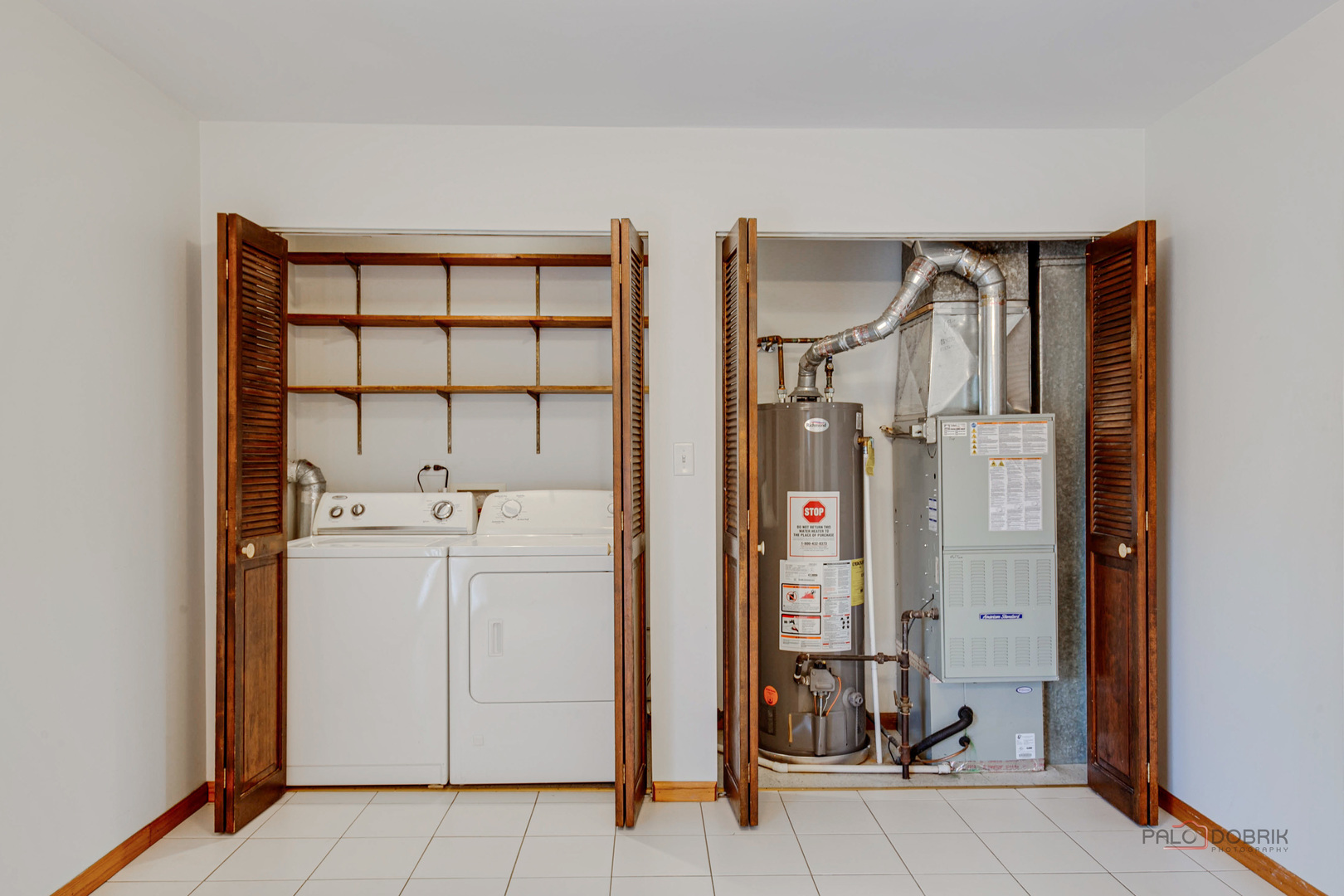 103 Quail Run Lake In The Hills, IL 60156 - Photo 8 of 25 a utility room with dryer and washer