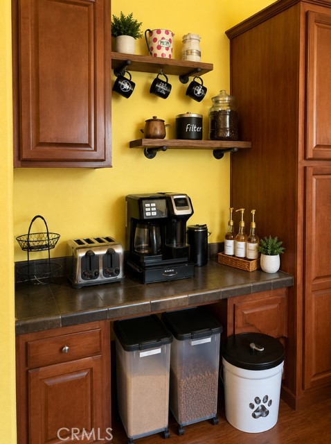 28820 Memory Winchester, CA 92596 - Photo 5 of 18 a kitchen with a sink and cabinets