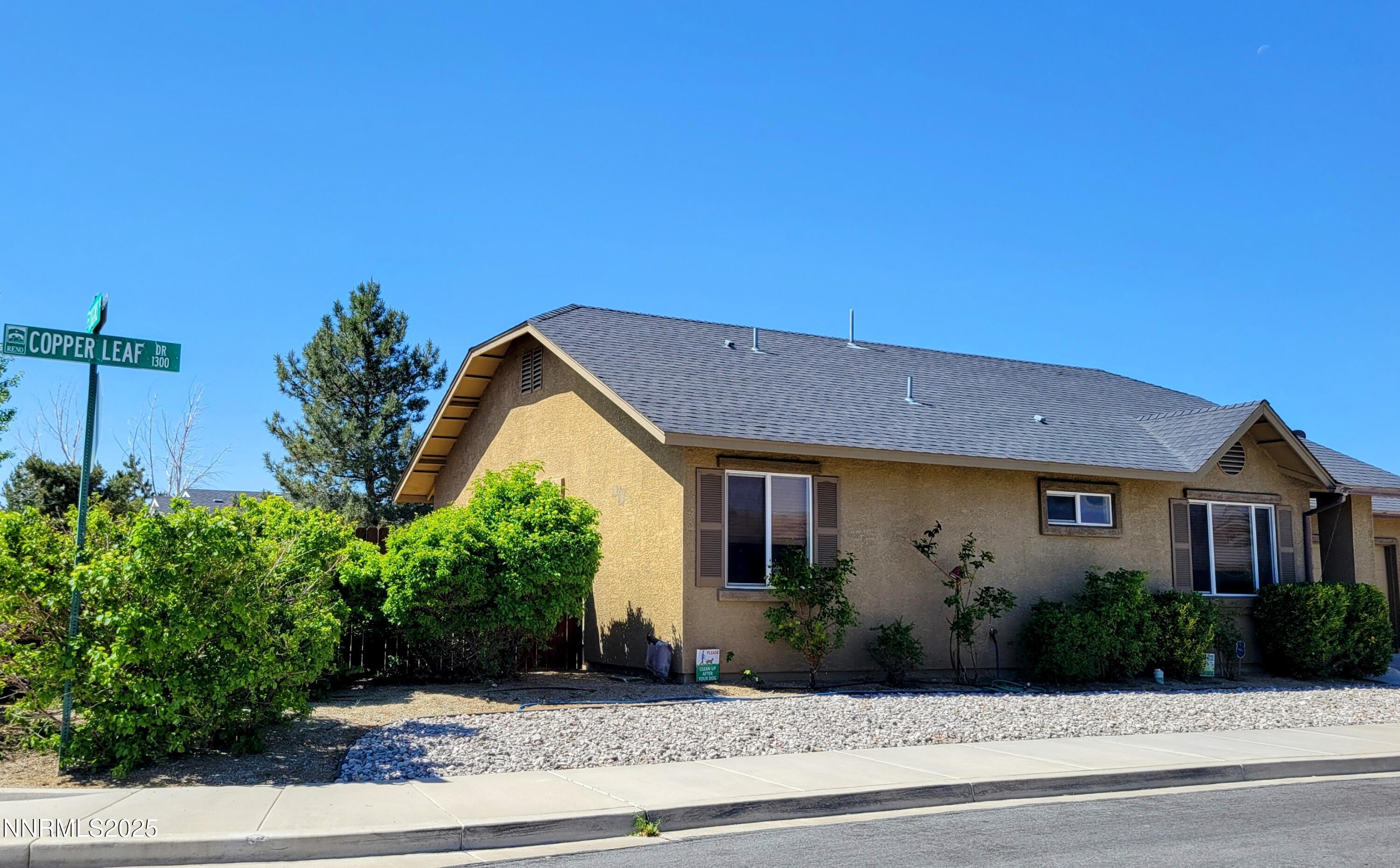 1390 Copper Leaf Drive Reno, NV 89506 - Photo 4 of 18 a house view with a garden space