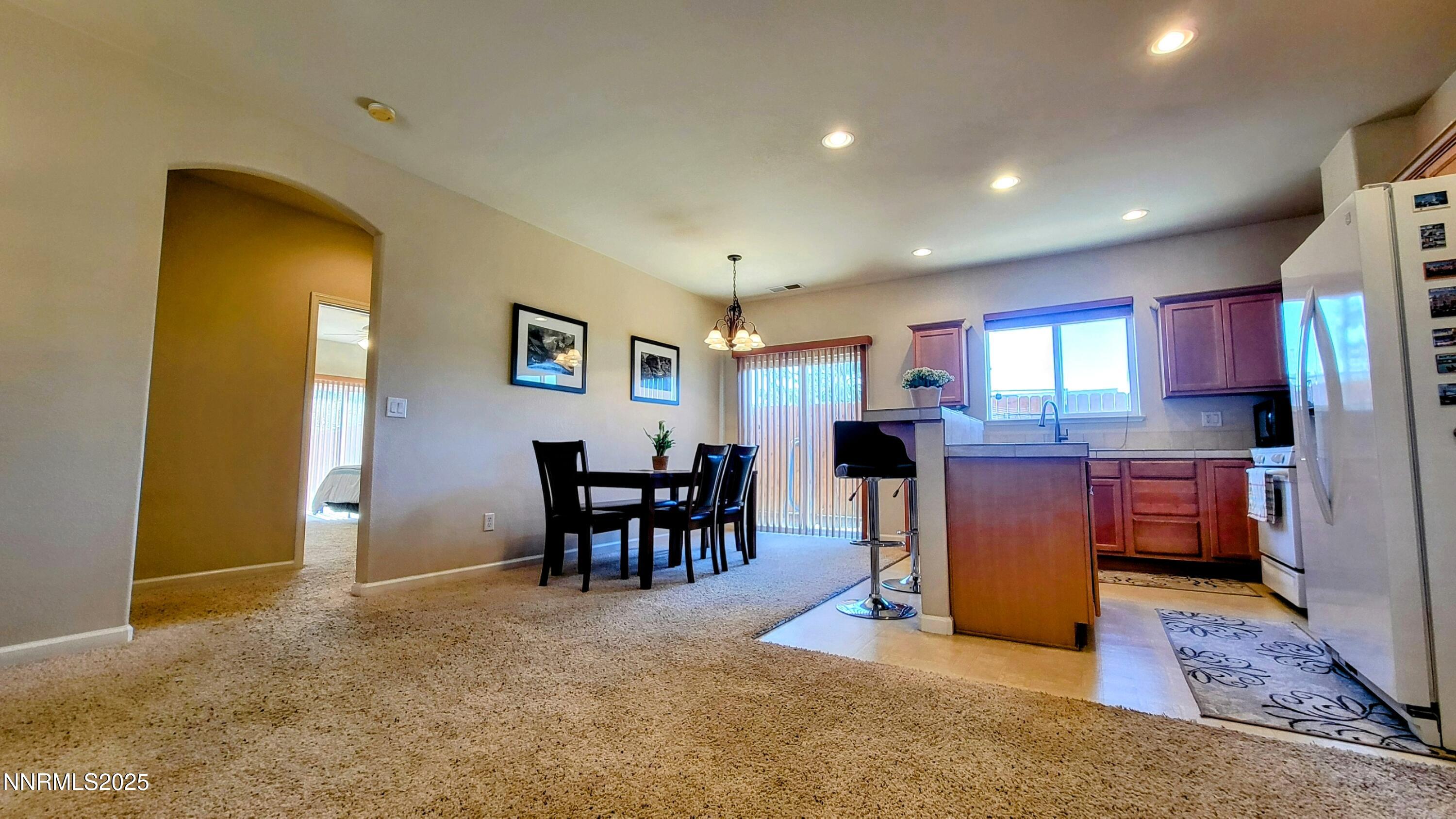 1390 Copper Leaf Drive Reno, NV 89506 - Photo 9 of 18 a view of kitchen with furniture and refrigerator