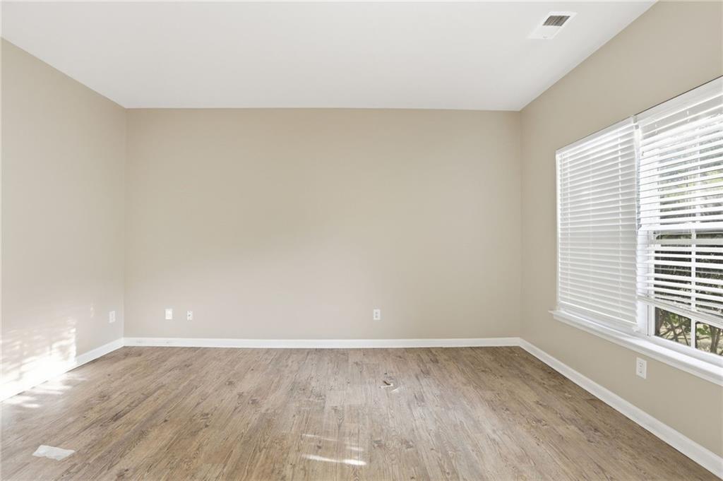 4968 Locherby Drive Fairburn, GA 30213 - Photo 19 of 39 a view of a room that has a window in it