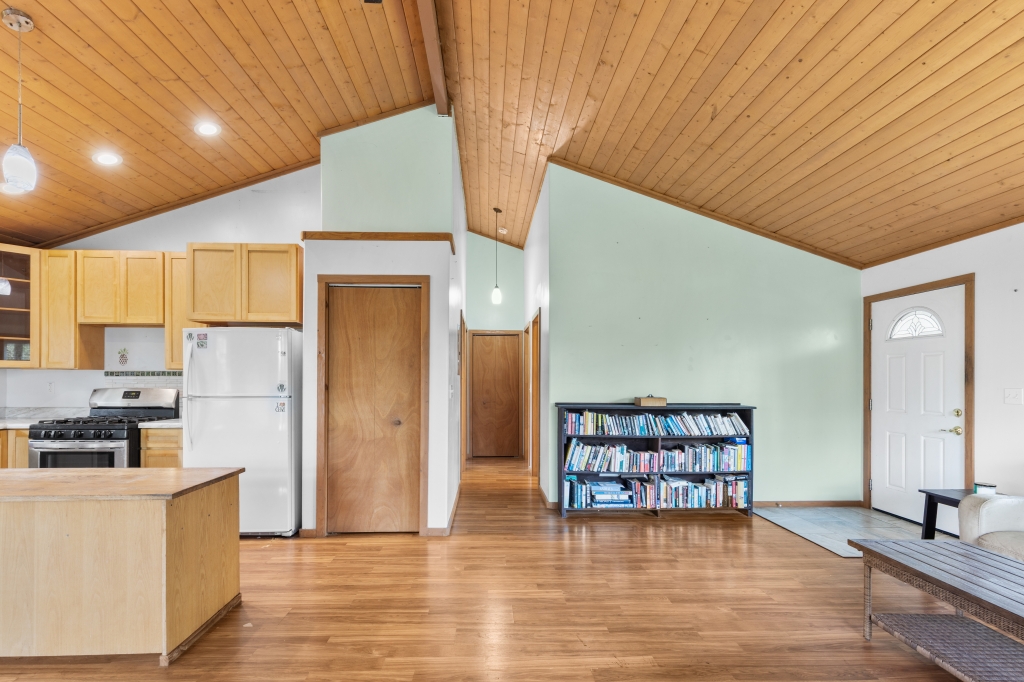 16-2103 Opeapea Road Mountain View, HI 96771 - Photo 8 of 30 a view of kitchen with furniture and wooden floor