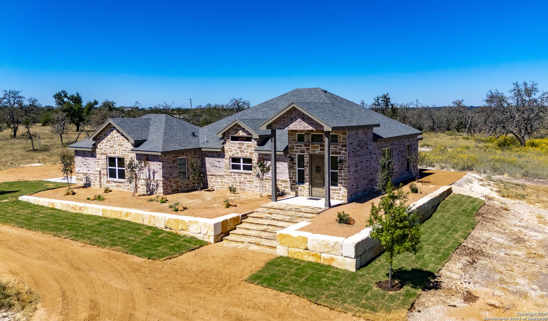 a view of a house with a patio