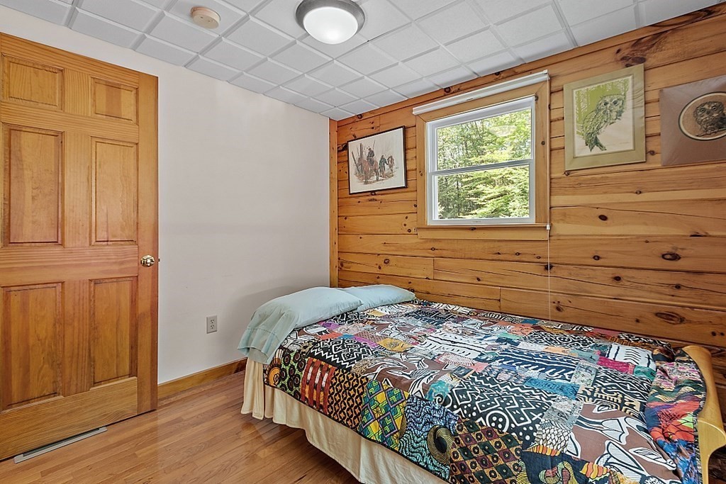 136 Wendell Road Warwick, MA 01378 - Photo 15 of 31 a bedroom with a bed and a window