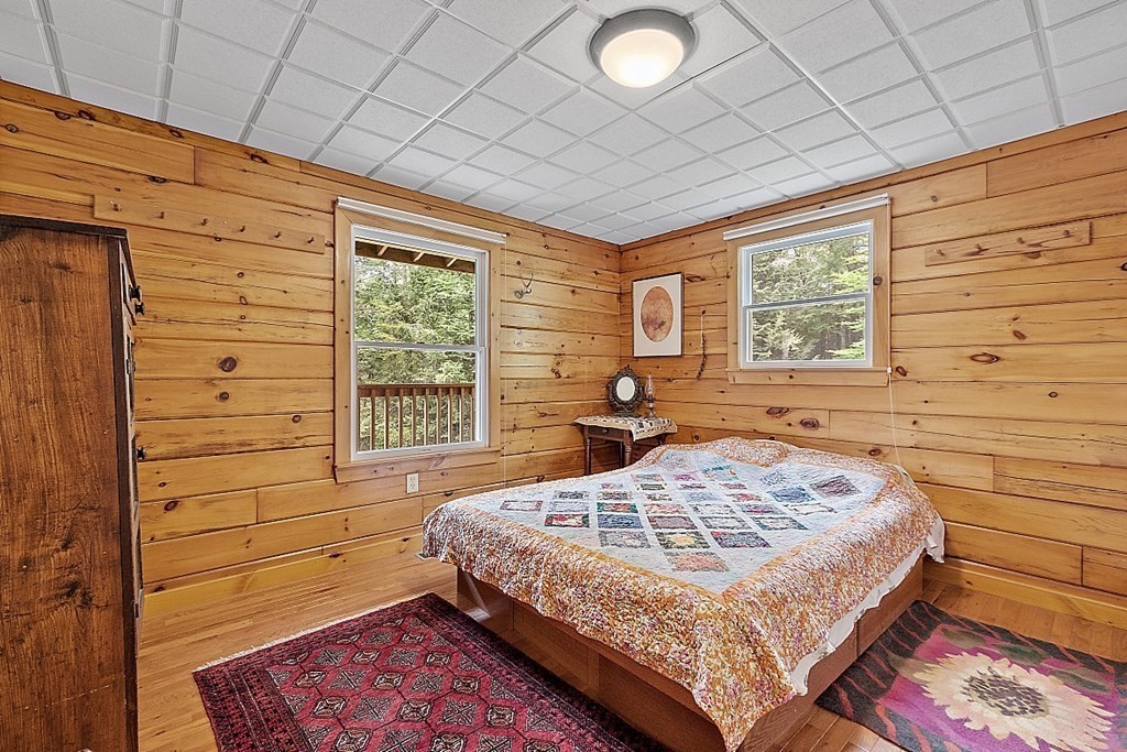 136 Wendell Road Warwick, MA 01378 - Photo 16 of 31 a bedroom with a bed and a window