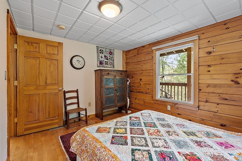 136 Wendell Road Warwick, MA 01378 - Photo 17 of 31 a bedroom with a bed and a window