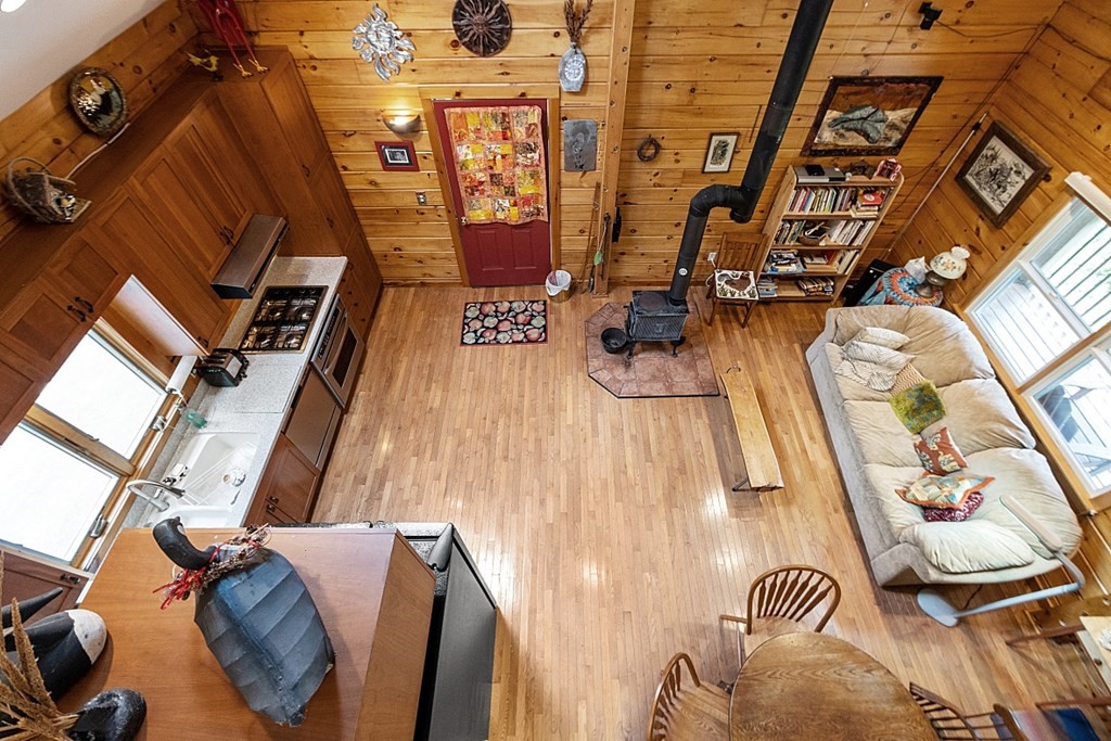 136 Wendell Road Warwick, MA 01378 - Photo 19 of 31 a picture of a room with furniture and floor to ceiling windows