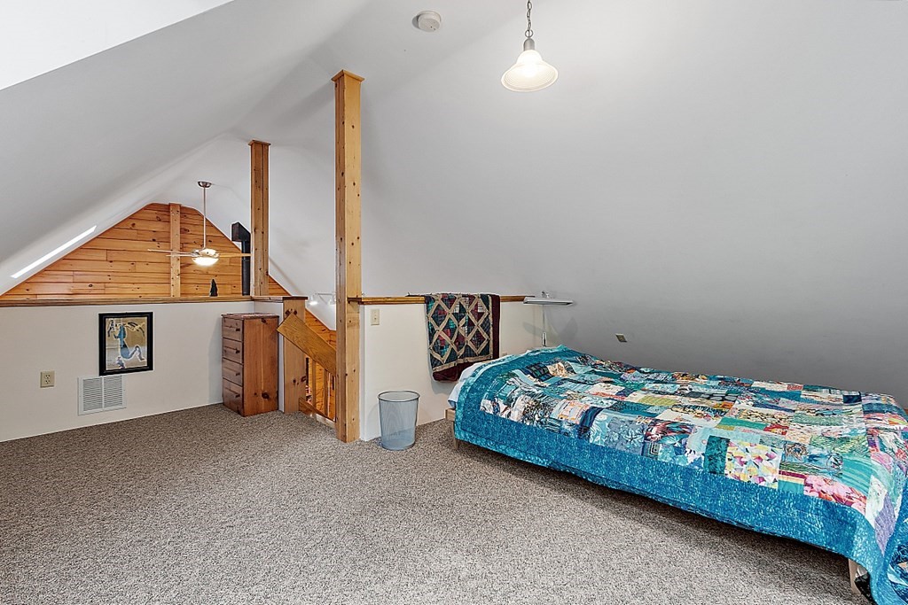 136 Wendell Road Warwick, MA 01378 - Photo 21 of 31 a bedroom with a bed and a dresser