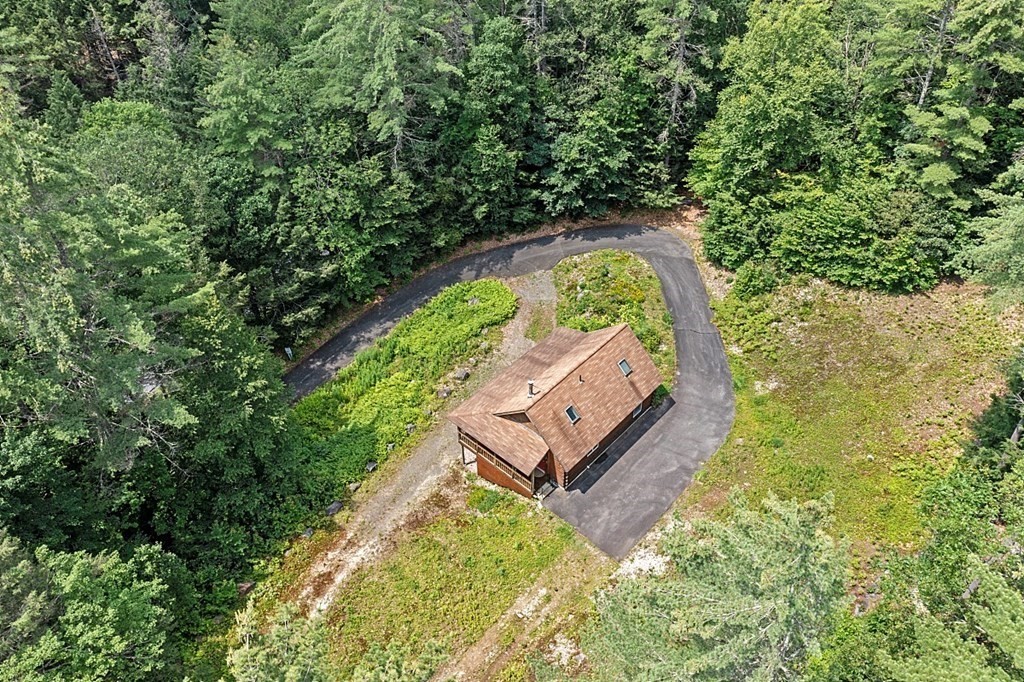 136 Wendell Road Warwick, MA 01378 - Photo 27 of 31 an aerial view of a house with a garden and swimming pool