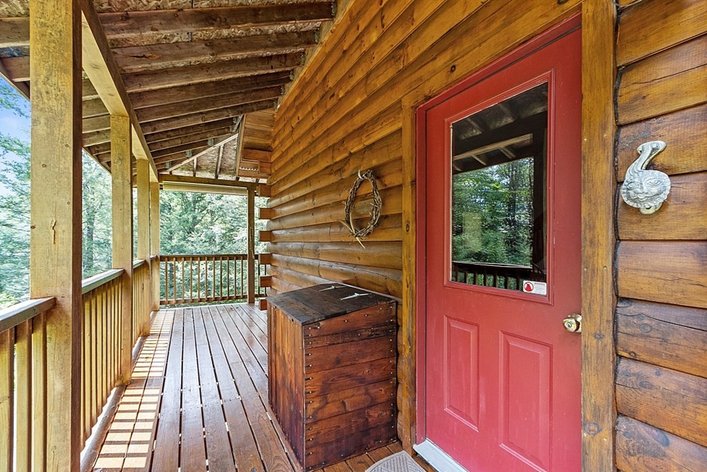 136 Wendell Road Warwick, MA 01378 - Photo 6 of 31 a view of a balcony with wooden floor and floor