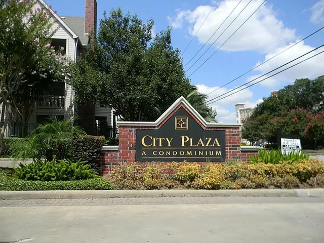 a street sign on a pole on a street