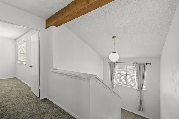 a view of a livingroom with wooden floor