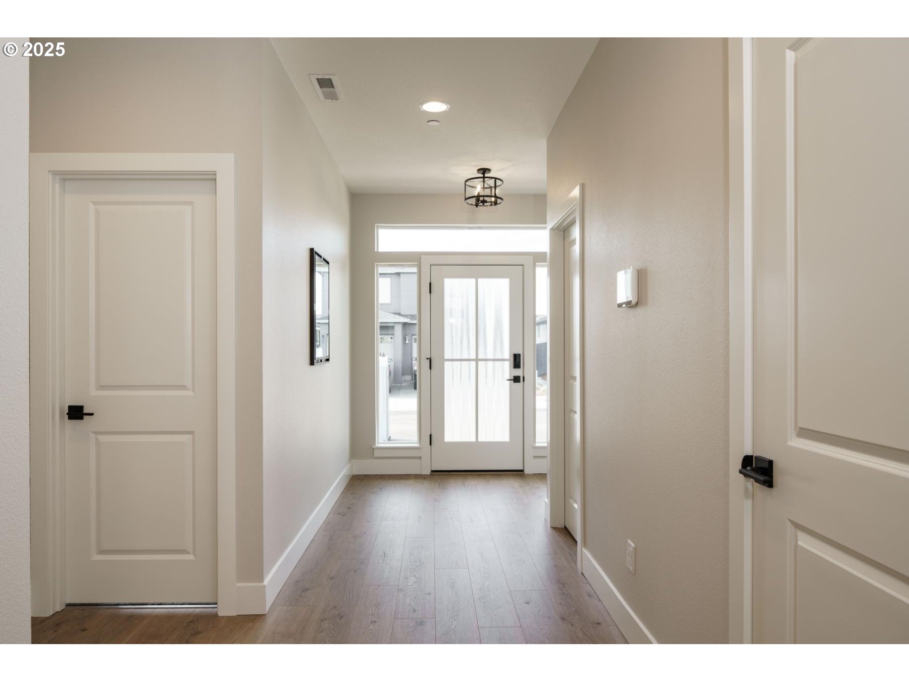 1126 South 46th Place Ridgefield, WA 98642 - Photo 18 of 43 a open hall with wooden floor