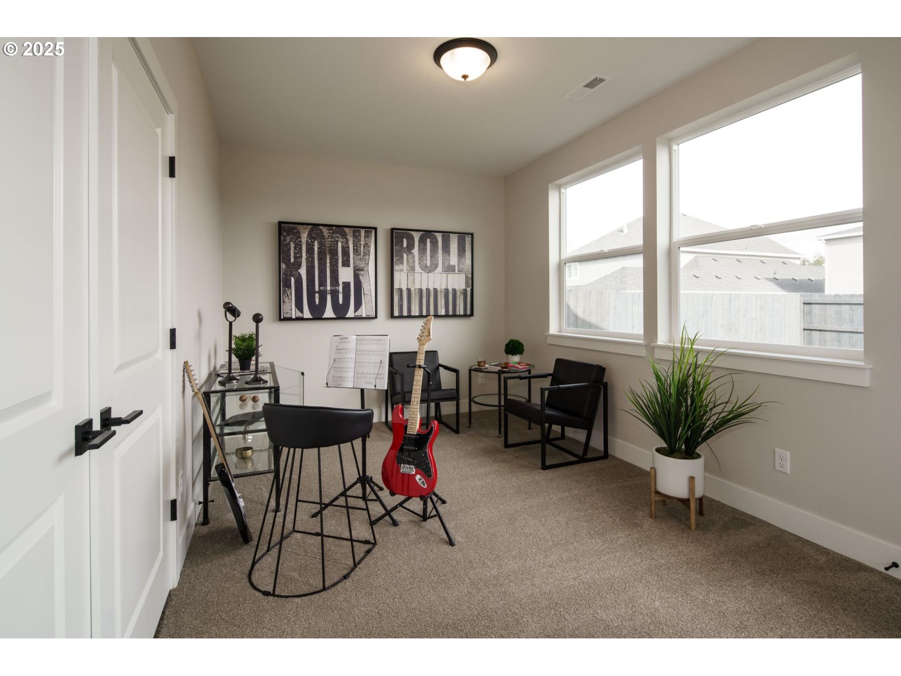 1126 South 46th Place Ridgefield, WA 98642 - Photo 29 of 43 a living room with furniture and wooden floor