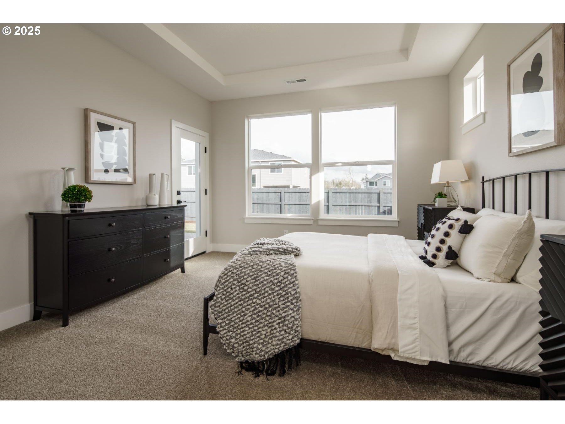 1126 South 46th Place Ridgefield, WA 98642 - Photo 34 of 43 a bedroom with a bed and a window