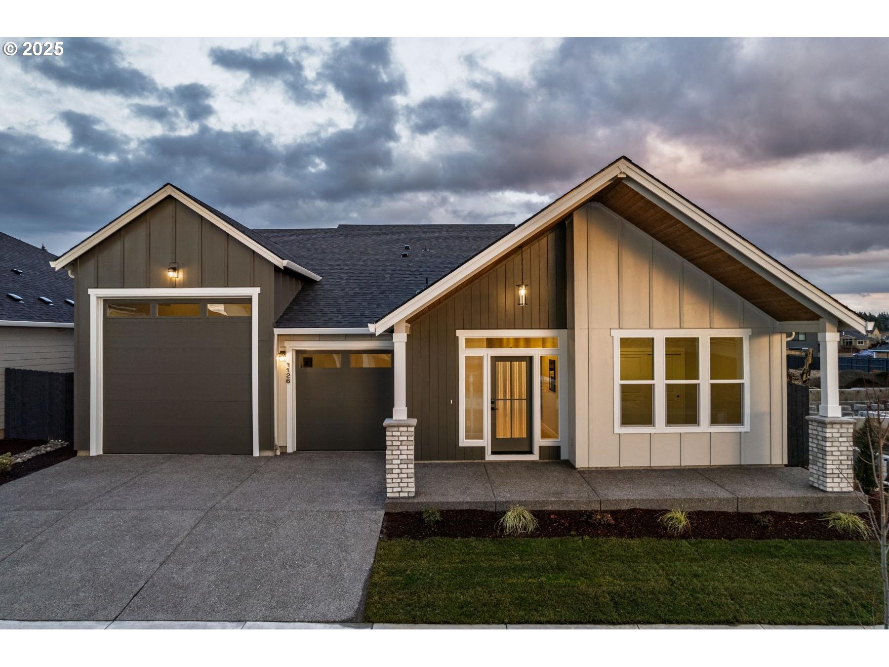 1126 South 46th Place Ridgefield, WA 98642 - Photo 43 of 43 a front view of a house with a garden