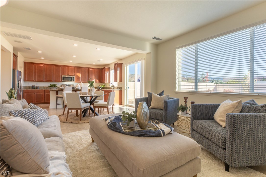 9779 Pachuca Reno, NV 89521 - Photo 4 of 16 a living room with furniture and a large window
