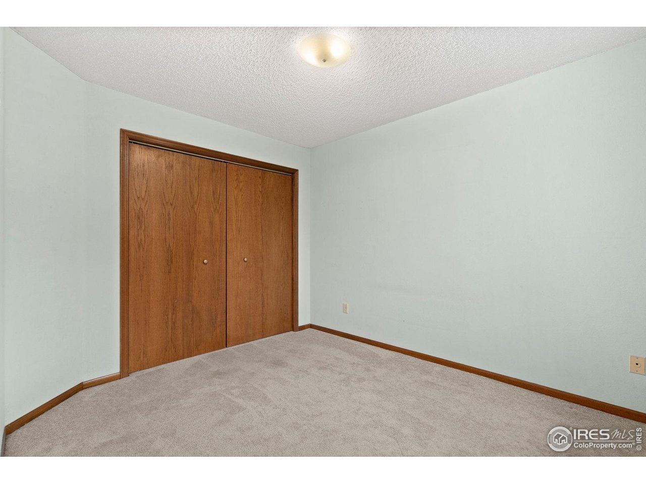 1213 West Swallow Road, Unit 213 Fort Collins, CO 80526 - Photo 16 of 24 a view of an empty room