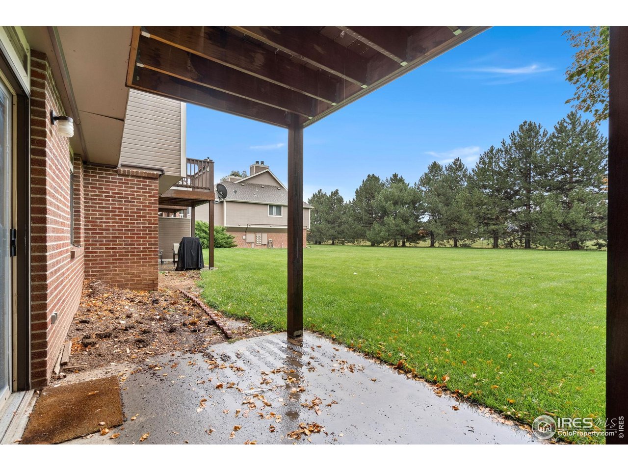 1213 West Swallow Road, Unit 213 Fort Collins, CO 80526 - Photo 23 of 24 a view of a backyard