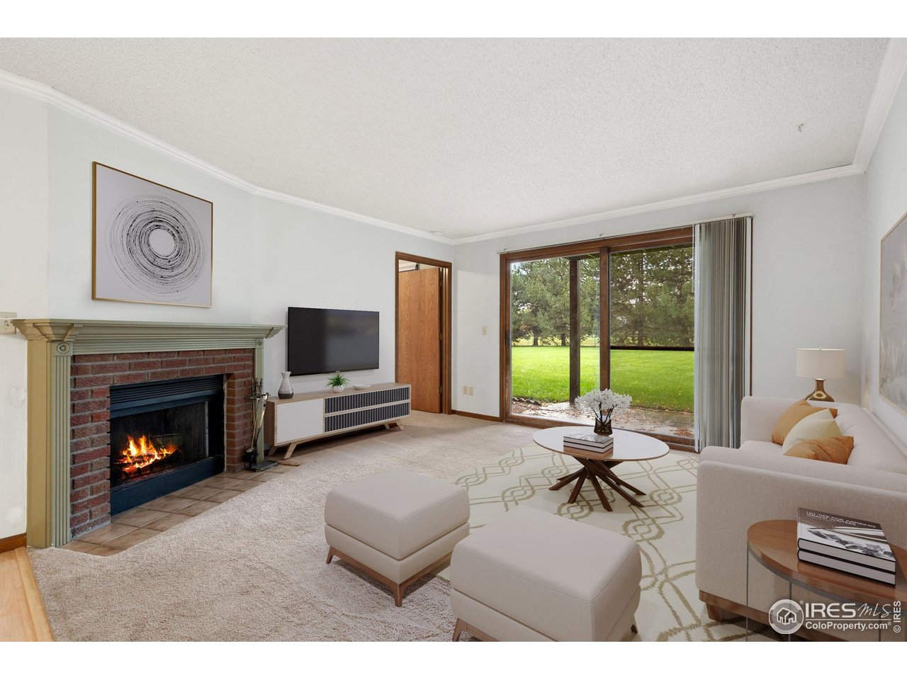 1213 West Swallow Road, Unit 213 Fort Collins, CO 80526 - Photo 4 of 24 a living room with furniture and a fireplace