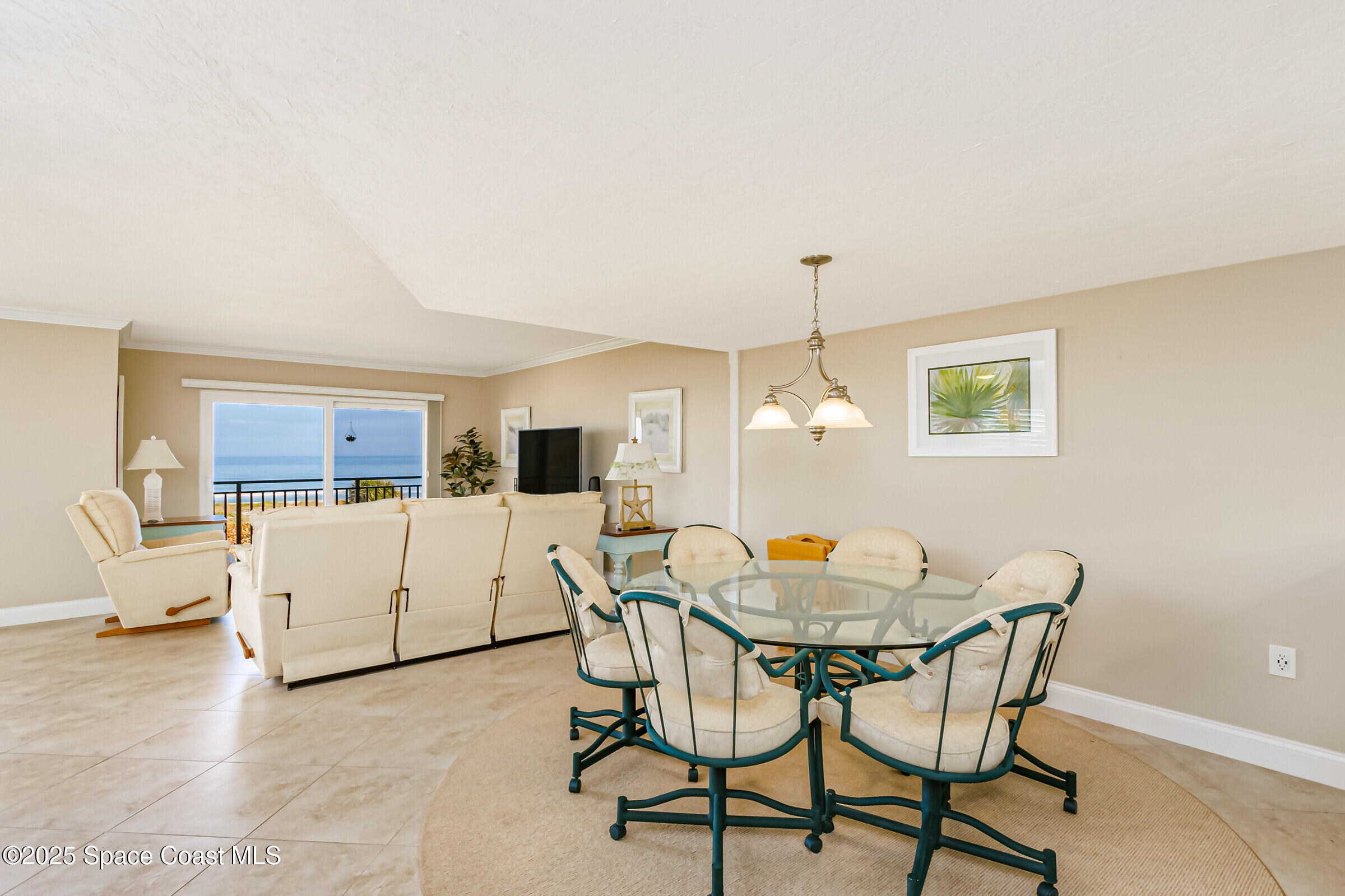 3060 North Atlantic Ave Corner, Unit 301 Cocoa Beach, FL 32931 - Photo 16 of 60 Spacious Dining Area