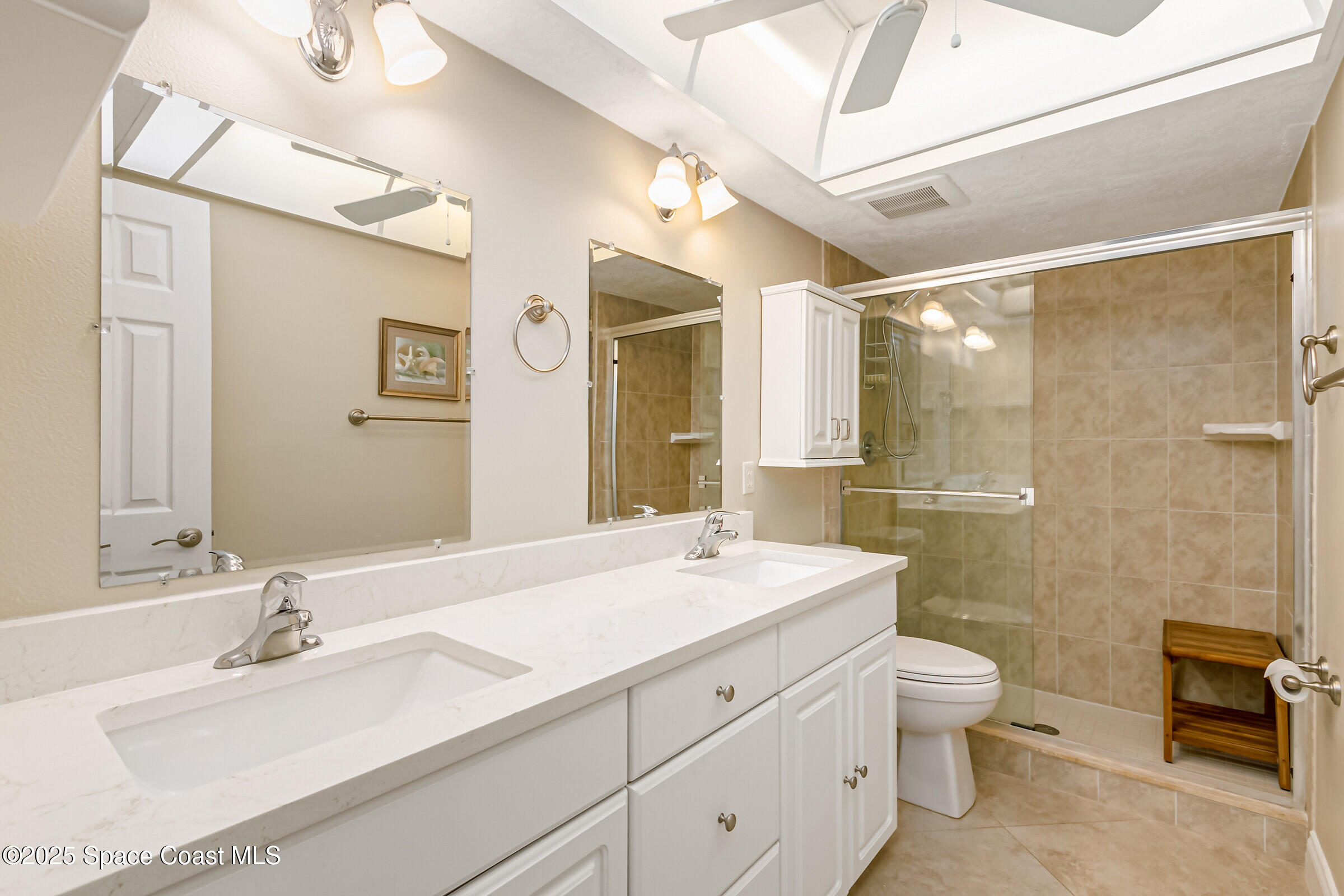 3060 North Atlantic Ave Corner, Unit 301 Cocoa Beach, FL 32931 - Photo 24 of 60 Ensuite Primary Bath