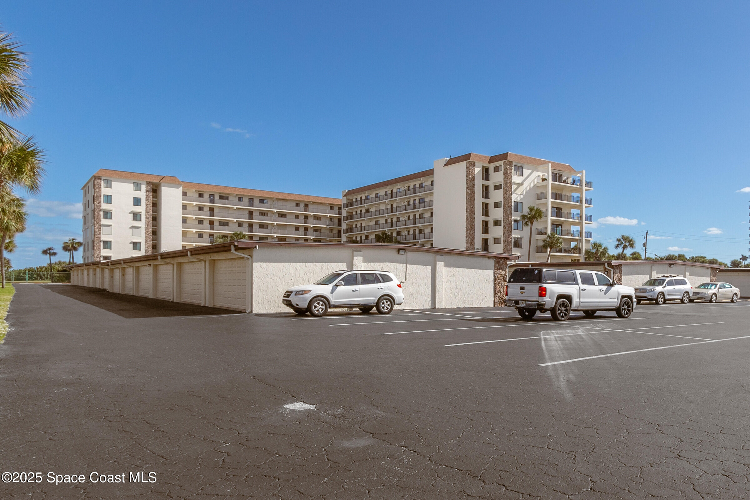 3060 North Atlantic Ave Corner, Unit 301 Cocoa Beach, FL 32931 - Photo 33 of 60 1 Car Garage Parking