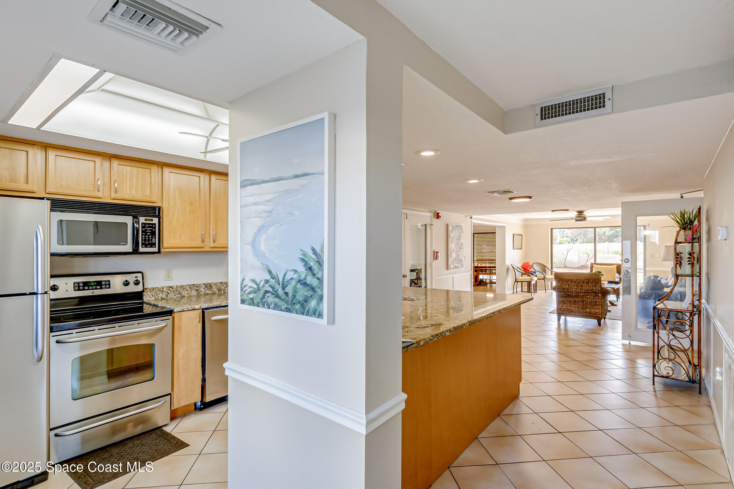 3060 North Atlantic Ave Corner, Unit 301 Cocoa Beach, FL 32931 - Photo 38 of 60 Clubhouse Kitchen