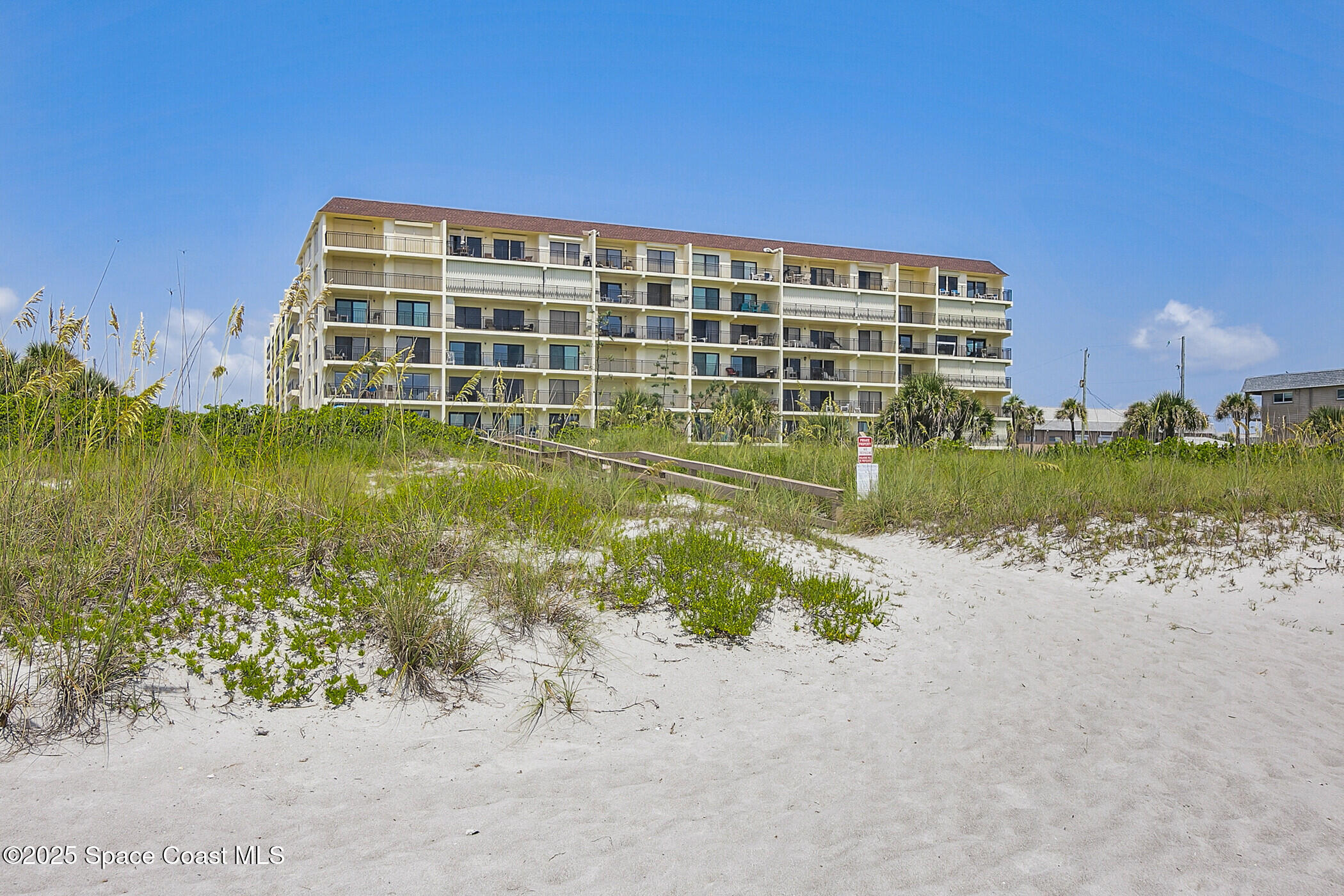 3060 North Atlantic Ave Corner, Unit 301 Cocoa Beach, FL 32931 - Photo 44 of 60 View back from the beach