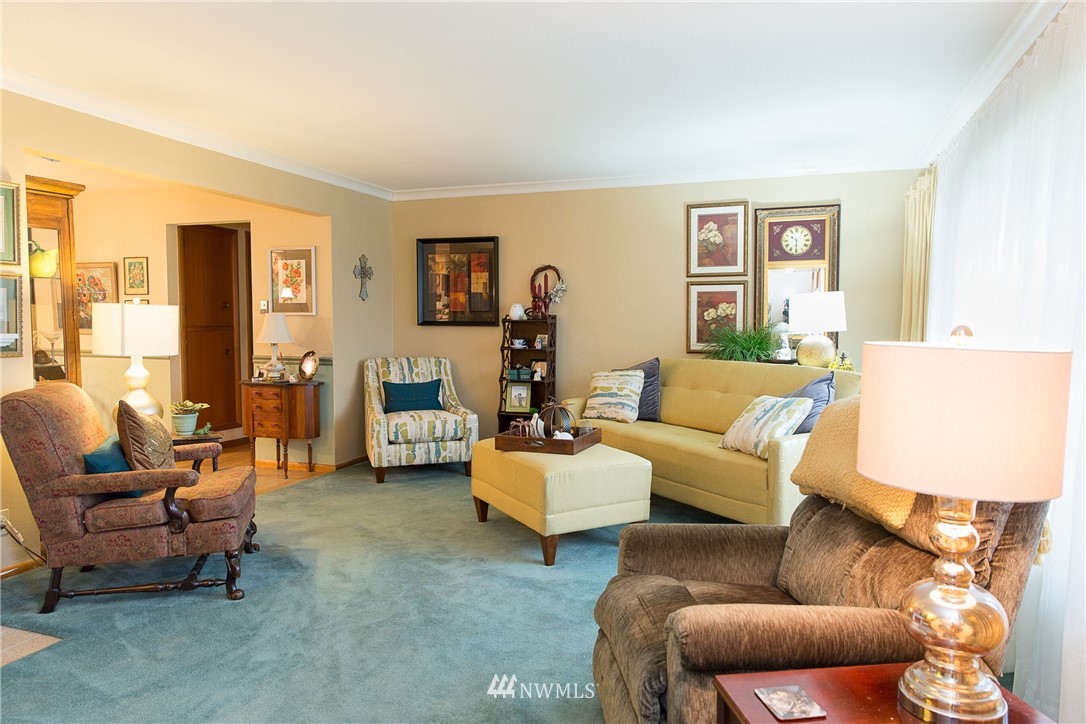 1419 18th Street Everett, WA 98201 - Photo 2 of 21 a living room with furniture and a large window
