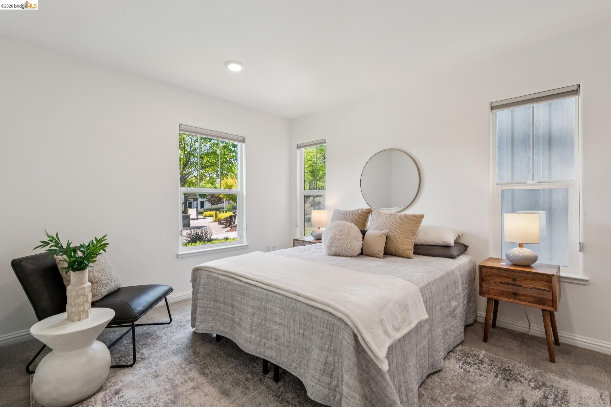 24157 Amaranth Loop Hayward, CA 94541 - Photo 9 of 63 Bright bedroom featuring white walls, recessed lighting, and two windows