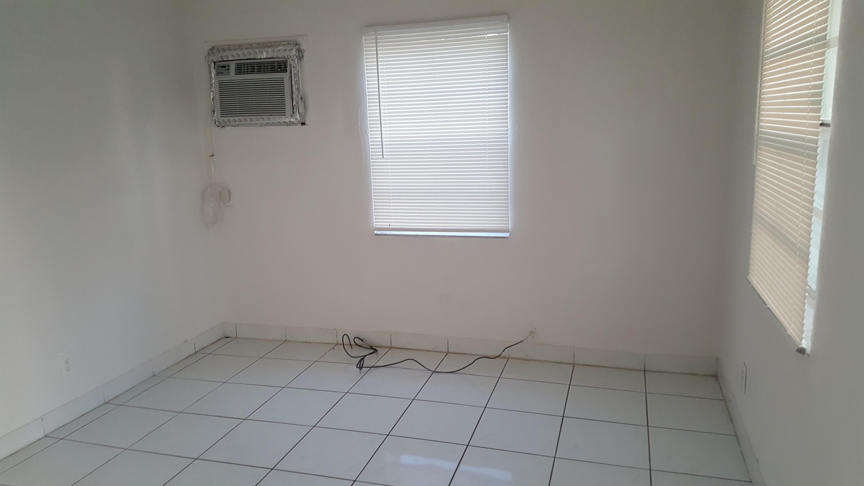 1548 Northwest 3rd Terrace Pompano Beach, FL 33060 - Photo 4 of 9 Living Room