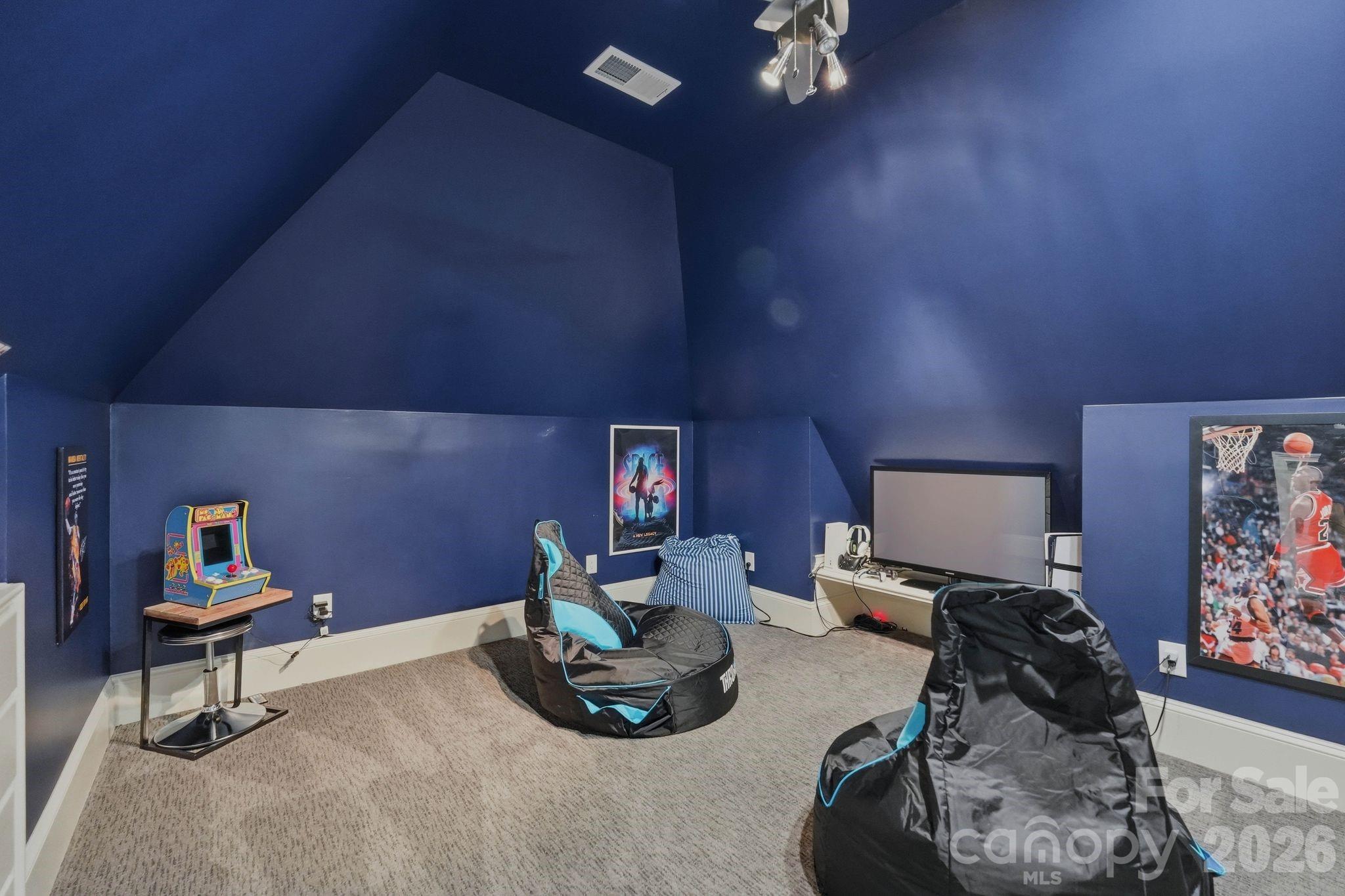 7416 Lee Rea Road Charlotte, NC 28226 - Photo 45 of 48 a room with furniture and a wooden floor