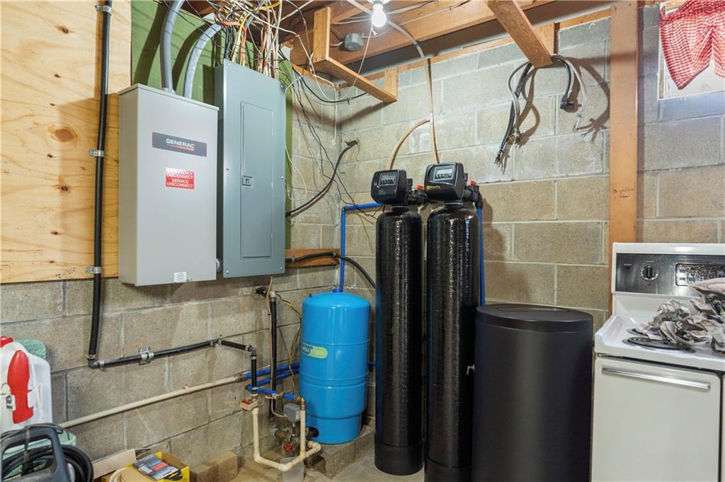 946 Crouser School Road Sandy Lake, PA 16145 - Photo 28 of 41 a bathroom with a sink and mirror